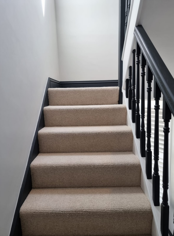 Charcoal balustrade & runner stairwell